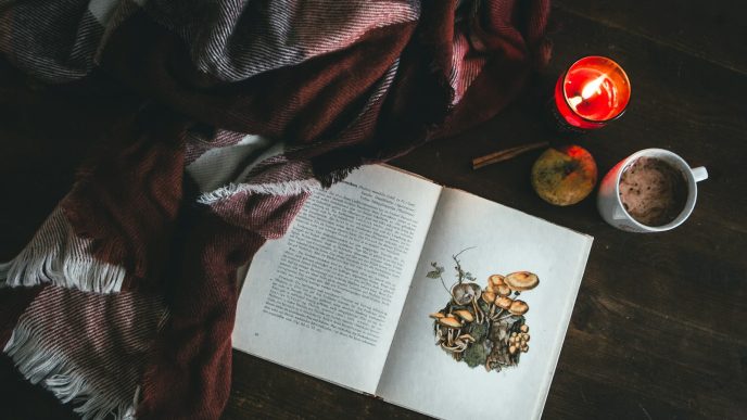 red textile near book on table